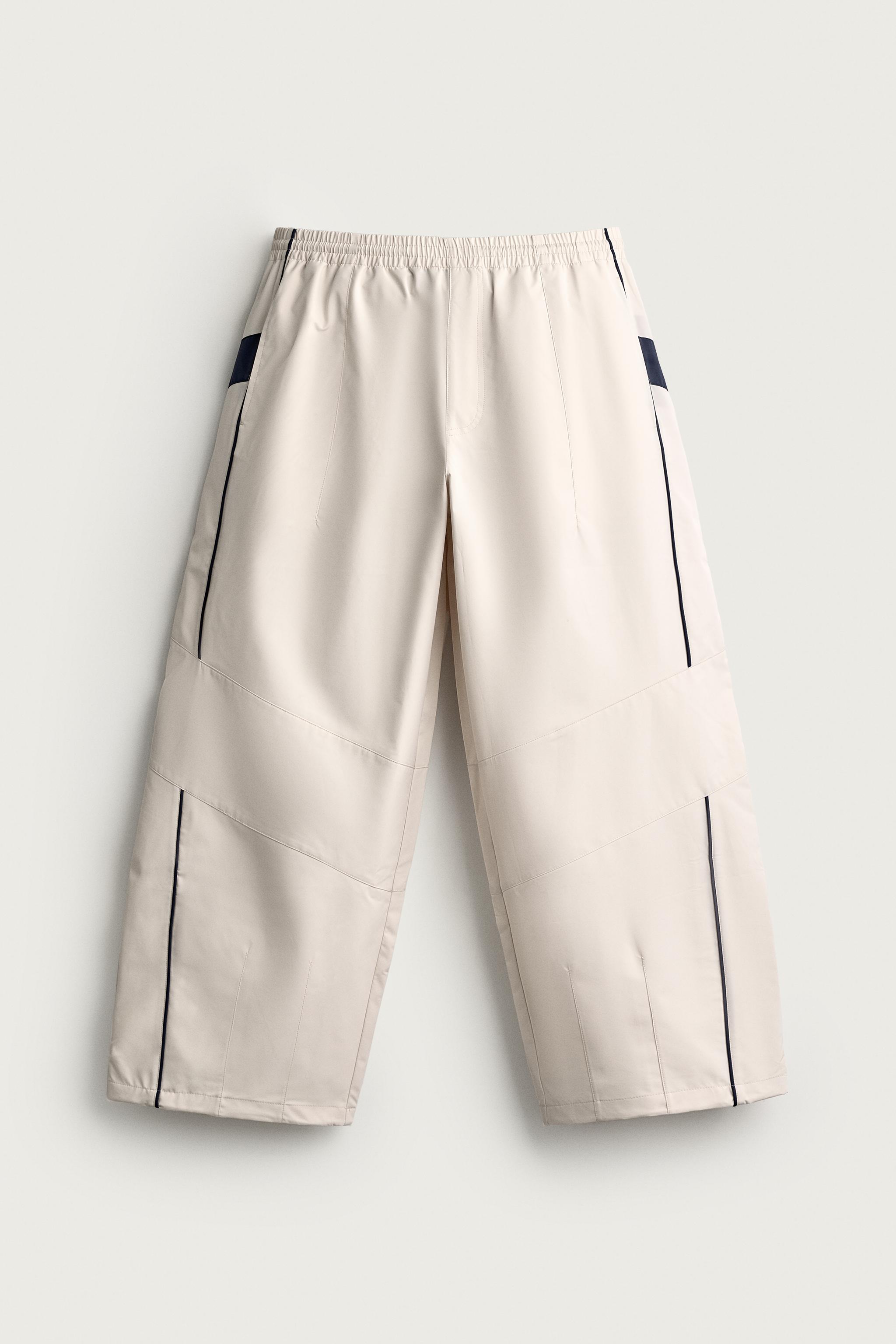 PANTALON TECHNIQUE À CONTRASTES DÉPERLANT